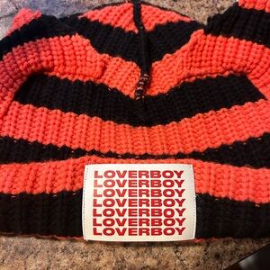 Orange and black loverboy hat